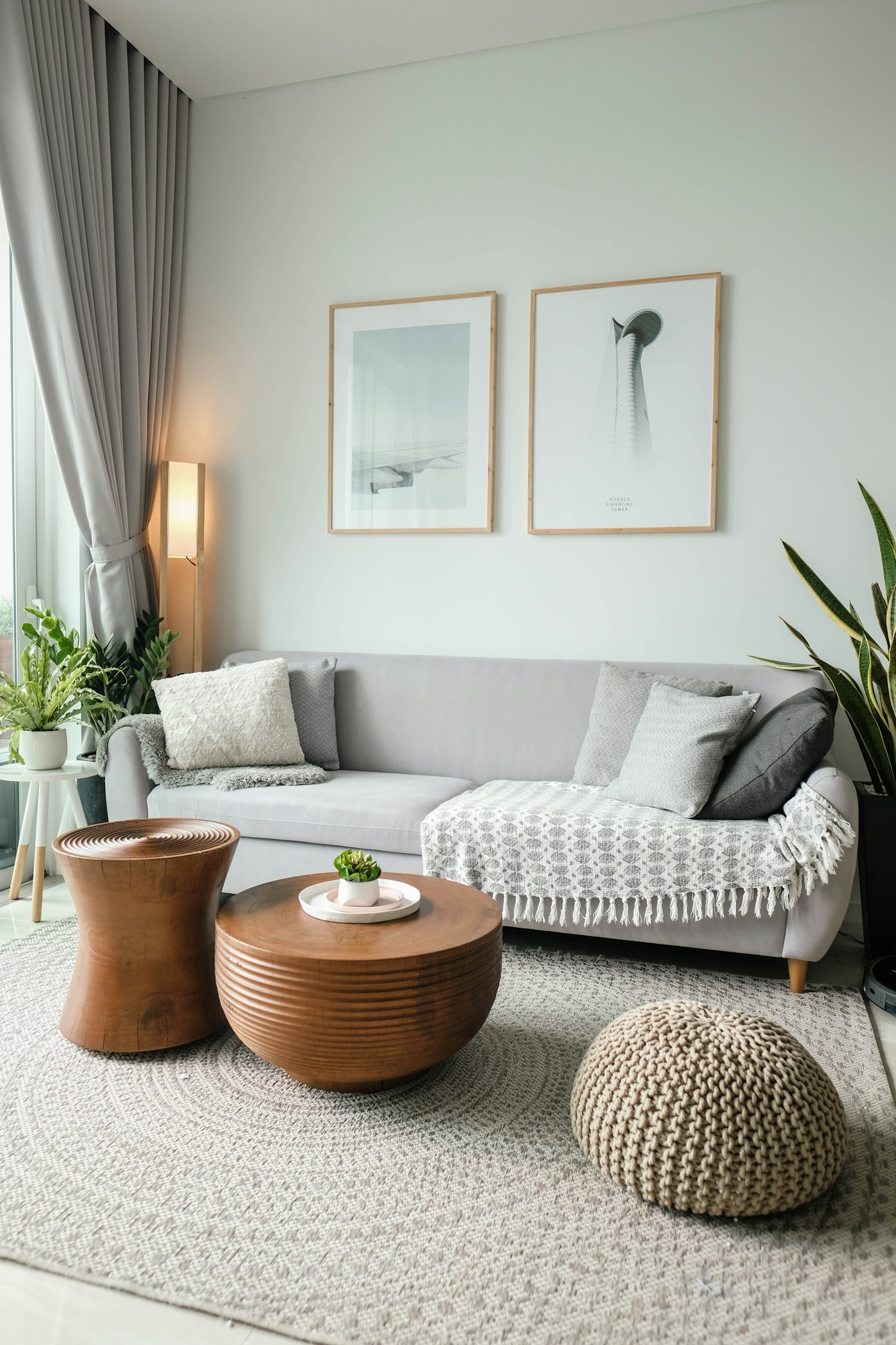 Living room with furniture and a large window letting in daylight